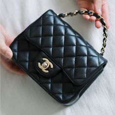 2019 Chanel Mini Square Classic Flap - Black Lambskin The Modernized Chanel Mini Square Classic Flap Bag Has Become One Of The Most Coveted And Sought After Chanel Styles. This Particular Bag Is Only 3 Years Old Is In Great Condition. Details: Width: 6.5 In Depth: 2.5 In Height: 5.5 In Chain Strap Drop: 20 In. Condition: Great Condition. Rubbing And Signs Of Wear On Corner Edges. Some Scuffs In Interior Flap. Gold Hardware Is Showing Signs Of Tarnishing. Accessories: Comes With Chanel Dust Bag. Black Double Flap Bag For Daily Use, Classic Black Flap Bag For Shopping, Chic Black Double Flap Bag, Luxury Everyday Black Shoulder Bag With Cc Turnlock, Black Flap Bag With Cc Turnlock For Everyday Use, Luxury Everyday Black Flap Bag, Black Formal Bag With Cc Turnlock Closure, Formal Black Bag With Cc Turnlock Closure, Designer Black Flap Bag For Everyday Luxury