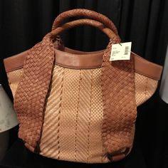 Large Tan/Brown Woven Tote Shopper Carryall Blue Interior Lining/ 2 Zip Pockets Brown Woven Leather Hobo Bag For Vacation, Cognac Woven Leather Bag, Brown Satchel With Braided Handles For Shopping, Spring Brown Hobo Bag With Double Handle, Brown Double Handle Hobo Bag For Spring, Brown Woven Leather Hobo Bag For Shopping, Brown Hobo Bag With Leather Handles For Spring, Brown Bags With Braided Handles, Chic Brown Hobo Bag For Spring