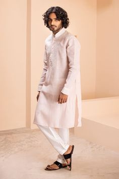 Baby pink linen kurta with placement dori embroidery on front. Paired with a contrasting plain aligadhi. - Aza Fashions Dori Embroidery, Men Kurta, Pink Linen, Aza Fashion, Baby Pink, Metal Working, Types Of Sleeves, Custom Made, For Men