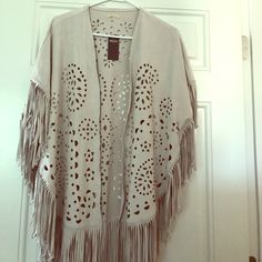 **** Never Worn*****Beautiful Embroidered, Beige Soft Suede Poncho With Flowing Fringes Beige Fringe Cardigan For Spring, Spring Beige Fringe Cardigan, Spring Fringe Shawl Outerwear, Spring Festival Shawl Outerwear, One Size Spring Cape Outerwear, Spring Cream Cape, Beige One Size Outerwear For Spring, Brown Long Sleeve Spring Cape, Brown Long Sleeve Cape For Spring