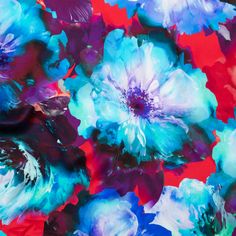 an abstract painting of blue and red flowers