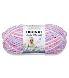 bernat baby blanket yarn in pink, purple and white colors on a white background