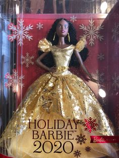 the barbie holiday barbie doll is in its box