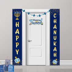 a happy hanukkah door banner with the words happy hanukkah on it