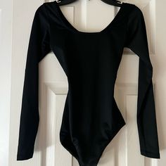 So Danca Black Long Sleeve Leotard. Never Worn Stretch One-piece Elastane Leotard, Solid Color Dancewear Bodysuit For Party, Dancewear Bodysuit For Parties, Fitted One-piece Elastane Leotard, Stretch Party Leotard, Party Leotard Solid Color With Stretch, Solid Stretch Party Leotard, Long Sleeve Bodysuit For Dance, Fitted Black Leotard For Party