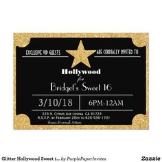 a black and gold hollywood ticket with a star on the front, it is shown