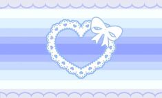 a heart shaped frame with a bow on the top and blue stripes in the background