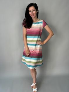 Colorful summer dress with short sleeves made of recycled polyester. Material composition 95% polyester, 5% elastane. A slightly fitted model that fits the figure perfectly. The combination of more colors makes it fresh and stylish. A great model for summer. Perfectly combined with elegant shoes or sneakers. We choose the fabrics and patterns for our clothes with care and love. We want you to feel great in them. We can make the dress according to your individual measurements, just send them to u Summer Stretch Mini Dress With Cap Sleeves, Casual Cap Sleeve Mini Dress For Summer, Fitted Short Sleeve Summer Dress, Casual Cap Sleeve Dresses For Summer, Pink Cap Sleeve Dress For Summer, Pink Cap Sleeve Summer Dress, Summer Midi Dress With Cap Sleeves, Multicolor Short Sleeve Midi Dress For Summer, Summer Multicolor Short Sleeve Midi Dress