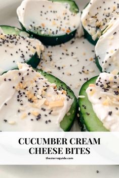 cucumber cream cheese bites on a white plate with black pepper sprinkles