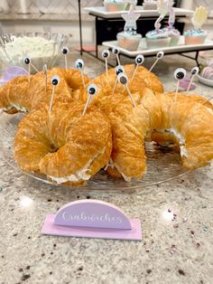 some croissants with googly eyes on them