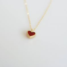 Tiny and dainty red agate heart filled with love and passion, such a perfect present for Valentine's Day and your loved ones. :: Style name: RDHRT-ENLN1034 :: Heart size: 7x7.5mm :: Material: 14k solid yellow gold :: Stone type: red agate Notes :: Jewelries are measured in millimeters and centimeters. :: Please read store policy before placing order. :: In stock items are ready to ship in 3 business days, made to order items are ready to ship in 2-4 weeks. :: International Shipping AVAILABLE. :: 14k Gold Charm Necklace For Valentine's Day Gift, Red Sterling Silver Necklace With Heart Pendant, Elegant Red Heart Pendant Jewelry, Elegant Red Heart Necklace For Mother's Day, Valentine's Day Jewelry Gift With Heart Detail, Red Heart Pendant Jewelry For Mother's Day, Minimalist Red Heart-shaped Jewelry, Valentine's Day Fine Jewelry Charm Pendant Necklace, Red Heart-shaped Sterling Silver Charm Necklace