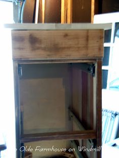 an old fashioned wooden cabinet is being used as a shelf