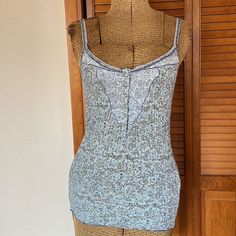 Vintage Rare Free People Ribbed Pointelle Henley Camisole In Indigo Floral Print With Lace Detail At The Neck And Snaps. Lace Trim Along The Neck And Spaghetti Straps. Slim Fit But Stretches Quite A Bit. Bust Stretches Up To 18” Approx. Absolutely Love This Style. New With Tags 100% Cotton Size Large Fitted V-neck Tank Top For Daywear, Fitted Casual Camisole For Daywear, Fitted Tank Strap Tops For Daywear, Fitted Tops With Tank Straps For Daywear, Fitted Tank Tops For Day, Fitted Top With Adjustable Straps For Daywear, Fitted Tank Top For Daywear, Blue Spaghetti Strap Tank Top With Lace Trim, Light Blue Fitted Cotton Tank Top