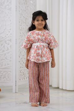 Our Girls Kurta Salwar is a must-have for your Girls. Made with 100% pure cotton cambric, this kurta is quite soft and tactile to touch making it a perfect match for your small one. Traditional print in pretty colours makes this kurta look distinctively good while wearing it. Composition: 100% cotton cambric Features Green colour Paisley print Coconut buttons Mandarin collar Relaxed fit Regular full sleeves Wash care : Hand wash separately in cold water. Use mild detergent. Dry in shade. Festive Short Sleeve Sets For Summer, Festive Cotton Pant Set For Diwali, Pink Cotton Sets For Diwali, Multicolor Cotton Sets For Navratri, Multicolor Cotton Sets For Festivals, Multicolor Short Sleeve Sets For Festivals, Multicolor Sets With Printed Motifs For Puja, Festive Multicolor Cotton Sets, Festive Short Sleeve Cotton Kurta