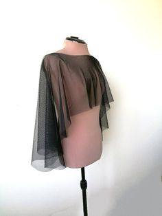 "Halloween cape, Black tulle  capelet, , Witch cover up This is simply  tulle cape, will be perfect compliment for your Halloween dress, Gothic or Vampire look.  Also It has a romantic yet minimalist feel, and would match many gown styles. DETAILS COLOR   - Black  LENGTH  front side- 30 cm (11,8'') back side 50 cm (20 \") SIZE  One size **IMPORTANT** * CUSTOMER WILL PAY FOR SHIPPING IN CASE OF RETURN *colours may vary from originals depending on computer monitor or smartphone settings. The produ Elegant Fitted Cape For Costume Party, Black Evening Cape, Elegant Black Capelet For Party, Elegant Black Party Capelet, Black Capelet For Party, Black Party Capelet, Black Fitted Capelet, Fitted Black Capelet, Chic Black Cape With Cape Sleeves