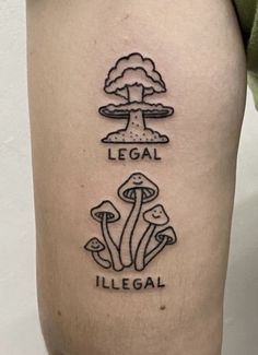 a tattoo on the leg of a person with mushrooms and legal written in black ink