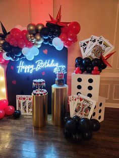 a casino themed birthday party with balloons and decorations