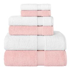 four towels stacked on top of each other in pink and white colors, with one folded