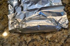 a piece of tin foil sitting on top of a counter