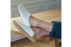 Our Bright White and Camel leather house slippers are in season year round. Inspired by a Moroccan babouche, made distinctly modern, they're the proper house shoes you'll feel chic in no matter what else you're wearing. Made entirely of leather, you'll wear them all day, all year. Lined with a durable, shock-absorbing cushion for extended comfort. You're known for your great finds, and these will become your go-to gift. Perforated dot pattern at the toe Packaged in a logo shoe bag Made of Italia Luxury Elegant Calf Leather Slippers, Luxury Leather Slippers For Galas, Luxury Leather Slippers With Leather Lining, Luxury Classic Calf Leather Slippers, Luxury Formal Calf Leather Slippers, Luxury Chic Slippers With Leather Sole, Luxury Casual Closed Toe Slippers, Luxury Leather Slippers For Work, Luxury Modern Leather Slippers