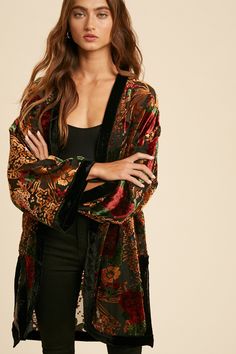 Rommee is a luxe sheer burnout kimono featuring a stunning velvet abstract floral print design and side slits. Features: long kimono sleeves, relaxed fit, open front, side slits Size + Fit: model is 5'7" and wearing a size small/medium Care + Content: 80% rayon, 20% nylon; contrast: 100% polyester Kimono Outfit, Velvet Kimono, Velvet Burnout, Burnout Velvet, Floral Print Design, Beautiful Kimonos, Long Kimono, Floral Kimono, Kimono Sleeve