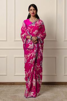 Hot pink saree featuring floral print with contrast blue piping on the hem. Comes with an unstitched blouse piece. - Aza Fashions Hot Pink Saree, Printed Saree, Pink Saree, Printed Sarees, Blouse Piece, Floral Fabric, Aza Fashion, Silk Satin, Piping