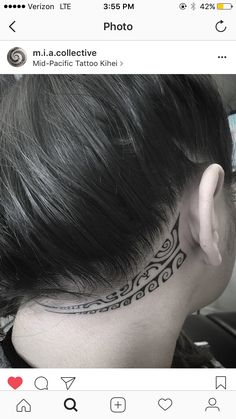 a woman with a tattoo on her neck