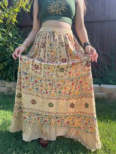 Pari Vintage vibe Light Brown Embroidery Maxi Skirt, perfect for embracing those boho hippie vibes! This stunning skirt features pleated boarder that adds a touch of elegance, while the maxi length offers a chic and comfortable fit. Crafted with fairycore fashion in mind, this skirt is ideal for creating enchanting cottage core looks. Whether you're strolling along sandy shores or exploring hideaways, this skirt will ensure you're dressed to impress. Its flowing silhouette captures the essence o Fairy Vibe, Fairycore Fashion, Brown Embroidery, Cottage Core Fairy, Skirt Aesthetic, Sandy Shores, Style Cottage, Floral Patchwork, Hippie Vibes