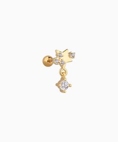 Transform into a celestial beauty with our twinkling star drop earrings. These small yet exquisite pieces will add a touch of elegance to any outfit, ensuring you stand out from the crowd. Embrace luxury and sophistication with these must-have accessories. Detail： -Post material: gold plated with internal stainless steel or stainless steel. Cubic Zirconia -Gauge: 16g | 1.2mm-Post length: 6mm-Top dimensions: 5.2mm Length x 5.3mm Width -Include: single item -Closure: screw ball back * Shop extra b Elegant Star Charm Earrings For Party, Elegant Party Earrings With Star Charm, Elegant Star Embellished Earrings As Gift, Elegant Star Embellished Earrings For Gift, Elegant Star Charm Cartilage Earrings, Elegant Dangle Earrings With Star Charm, Elegant Gold Star Cartilage Earrings, Elegant Gold Cartilage Earrings With Star Charm, Elegant Star Shaped Cartilage Earrings With Star Charm