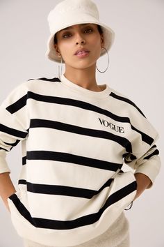 Oversized VOGUE sweatshirt cream with black stripes and small logo embroidery made of 100% organic cotton. The VOGUE sweater with dropped shoulders and oversized fit is sustainably and fairly manufactured in Portugal. The model is wearing size S. Discover the striped VOGUE sweatshirt in other colours like dark green and red . Vogue Collection, Stripe Sweatshirt, Striped Sweatshirt, Quality Logo, Striped Sweatshirts, Vogue Japan, Denim Details, Logo Embroidery, Green Stripes