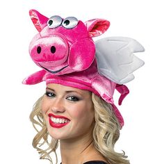 Flying Pig Hat. A great gag item! This hat is proof pigs do fly, at least sometimes. Pink with white wings and has a pink tail. One size fits most adults upto Large.Base Material: 100% PolyesterCare: Hand WashCountry of Origin: Made in US Pig Character, Novelty Hats, Wig Hat, Funny Costumes, White Wings, Flying Pig, Halloween News, Funny Halloween Costumes, Halloween Accessories