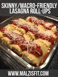 lasagna casserole with cheese and sauce in a glass dish on the counter