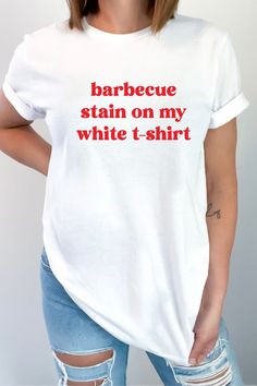 #BBQStain #TeeLife #WhiteTShirt #TimMcGrawMerch #CountryStyle #CountryGirlShirt #SummerBBQ #FourthofJuly #CountryMusic #TeeLove #StainLife #RedWhiteAndBBQ #TimMcGrawFan #CountryVibes #SummerStyle #BBQParty #CountryFashion #CountryChic #TShirtLove #BBQLife #CountryGirlLife #SummerFun #IndependenceDay #TimMcGrawMusic #CountryPride #TeeFashion #GrillinAndChillin #CountryMusicFan #SummerMemories Funny White Short Sleeve Top, White Cotton Tops With Text Print, Funny White Crew Neck Shirt, Funny White Shirt With Screen Print, White Funny Shirt With Screen Print, White Funny Text Top, Funny White Cotton Shirt, White Cotton Shirt With Funny Style, Funny White Shirt With Text Print