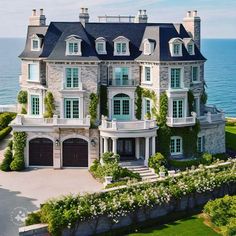 this is an aerial view of a large house with many windows and balconies