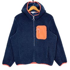 Uniqlo JW Anderson Zipper Hoodie Fleece Jacket Size Medium * Made in : China * Size on Tag : M * Manual Measurement (inch) : Chest 23.5, Length 25, Shoulder 18.5, Sleeve 22, Hem 18. * Recommended for Size : Medium (M) * Material : Polyester  * Colour : Navy Blue with Orange stripes  * Condition : Good * See photos for details. * Free Defect : No Stain, No Holes, No Tears, No Faded. 6515 Navy Fleece Sweatshirt For Winter, Winter Half-zip Hoodie With Double-lined Hood, Navy Hooded Sweatshirt With Pockets, Winter Outdoor Sweatshirt With Ykk Zipper, Cozy Hooded Fleece Jacket With Zipper Closure, Winter Half-zip Sweatshirt With Double-lined Hood, Winter Hooded Track Jacket With Zipper Closure, Hooded Fleece Jacket With Zipper Closure For Cold Weather, Hooded Fleece Jacket With Zipper For Cold Weather