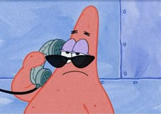 spongebob with sunglasses on talking on the phone