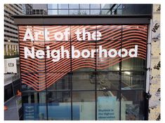 an advertisement on the side of a building that says, art of the neighborhood '