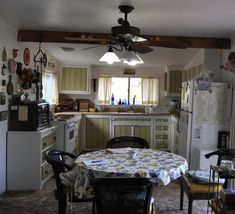 the kitchen is clean and ready to be used for dinner or family meals, as well as other things that are on the table