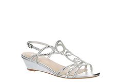 a woman's silver wedged sandal with crystal embellishments and an open toe