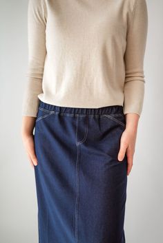 With the look of real denim but the feel of soft knit, comfort is the key element in our Caroline skirt. The quick, effortless pull-on style makes this skirt an effortless option for every day. Larger waist-size? The elastic waistband gives stretch without feeling bulky. A skirt like this will take you through the day, from grocery shopping to making dinner, or even a quick coffee shop visit for a chat with a friend over lattes! This skirt has become a best-seller. Style: elastic waist, soft knit fabric, functioning back pockets Color: navy denim Fabric content: 65% Cotton, 30% Polyester, 5% Spandex Care instructions: wash gentle cycle, cold; lay flat to dry, cool iron if needed. Our sizing is always approximate and can also vary due to personal preference and body shape. Please allow a 1" Making Dinner, Quick Coffee, Be Intentional, Knit Maxi Skirt, Modest Clothing, Long Knit, Grocery Shop, Curated Gifts, Grocery Shopping