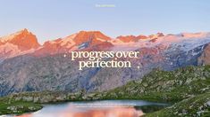 a mountain range with the words progress over perfection written on it