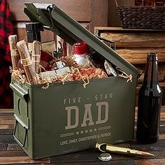 a crate filled with bottles and wine on top of a wooden table next to a bottle opener