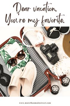 an open suitcase with shoes, sunglasses and other items in it that says dear vacation, you're my favorite