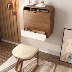 a wooden cabinet with drawers and a stool in front of it on a rug next to a framed photograph