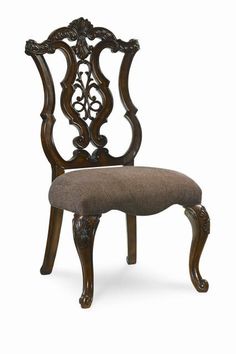 an antique style chair with a brown upholstered back and armrests, against a white background