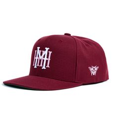 The MHH Heritage logo was designed by our founder, Mike Kurtz, in the early inception of the brand. Front of the hat features the MHH Heritage logo in puff embroidery. Left side of the hat features the original Mike's Hot Honey bee logo from 2010. Structured, six-panel, high-profile, burgundy, snapback hat. Embroidered locally in New York, NY. Red Snapback Hat With Embroidered Logo, Red Snapback Hat With Embroidered Logo One Size, Team-colored Embroidered Logo Snapback Hat, Sports Embroidered Logo 5-panel Snapback Hat, Black Six-panel Snapback Hat With Embroidered Logo, Inception, Snapback Hats, Dad Hats, Buckle