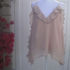 Zara Sleeveless Top Frilly Feminine New With Tags Size Large Soft Feminine Frilly Flirty With Ruffles Sleeveless Spaghetti Straps Top New By Zara Large Size: Large 22.5" Pit To Pit 16"Underneath To Hem Fabric:100% Polyester Condition: New Or New With Tags Item#0209-Peach-Orange Bins Weight: 5oz Check Out My Closet To Find More Great California Style Clothing! Feel Comfortable Purchasing From Me I Am A 5-Star Posh Ambassador Ii With Same Or Next Day Shipping ** Get $10 In Posh Credit By Entering Chic Beige Tank Top For Party, Chic Beige Party Tank Top, Spring Party Camisole, Party Camisole For Spring And Summer, Beige Tank Top For Summer Party, Feminine Cream Tank Top For Spring, Elegant Beige Tank Top For Spring, Beige Summer Party Blouse, Chic Beige Tank Top For Spring