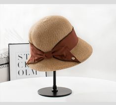 Cute straw hat with a variety of colours to choose. Perfect for daily wear! It is nicely crafted with premium quality of straw.An ideal gift for her!Specifications-Material: 100% straw-Size: 56-58cm Brown Straw Hat With Short Brim, Brimmed Brown Straw Hat, Short Brim Brown Straw Hat, Brown Short Brim Straw Hat, Brown Woven Straw Bucket Hat, Brown Paper Straw Fedora Hat, Brown Straw Bucket Hat With Flat Brim, Elegant Woven Straw Bucket Hat, Brown Straw Bucket Hat With Curved Brim