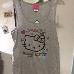 This Is Hello Kitty Sleepwear Tops One Grey One Pink,Both Never Worn It! Playful Sleeveless Loungewear Top, Hello Kitty Print Sleeveless Top For Spring, Sleeveless Hello Kitty Print Top, Casual Cotton Tank Sleepwear, Hello Kitty Print Tops For Summer Loungewear, Multicolor Hello Kitty Print Tops For Spring, Fun Pink Cotton Tank Top, Cute Pink Tank Top For Loungewear, Cute Multicolor Cotton Tank Top