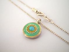 "Unique opal necklace. Tiny mint green & gold boho pendant necklace. Resin & sterling silver necklace. Every woman needs a gorgeous opal necklace that she'll treasure forever. This tiny, lightweight pendant necklace will keep your look feminine and elegant. A beautiful, classic addition to both your every day & evening wear. This necklace although small, will not go unnoticed, get ready to receive a lot of compliment on it! A great valentine's day, mothers day, or birthday gift for m Gold Bohemian Necklaces With Cabochon, Bohemian Gold Cabochon Necklaces, Gold Bohemian Cabochon Necklace, Bohemian Gold Cabochon Necklace, Green Necklace With Coin Pendant, Green Necklace With Coin Pendant As Gift, Turquoise Necklace With Coin Pendant As A Gift, Green Necklace With Coin Pendant For Gift, Green Coin Pendant Jewelry